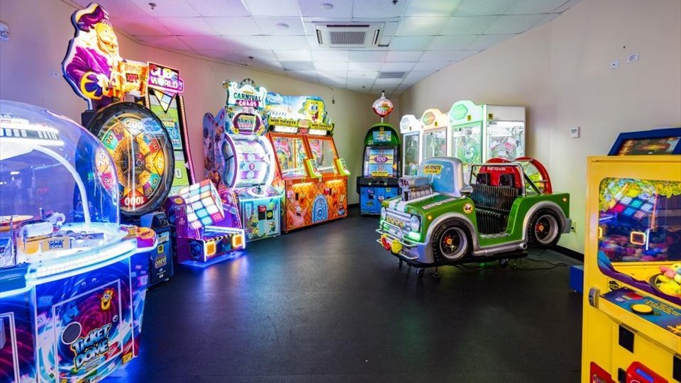 a room filled with arcade machines and games